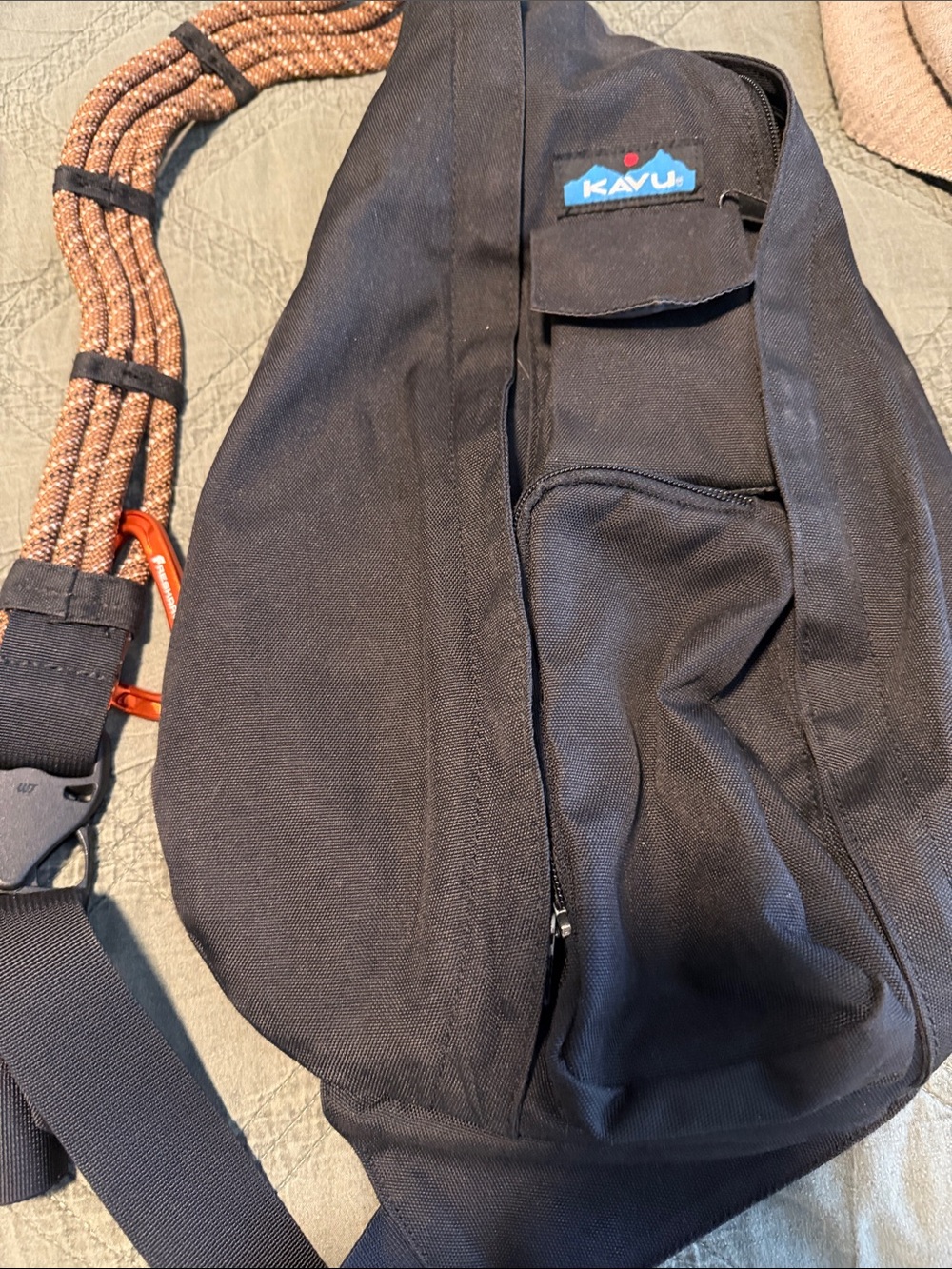 Kavu Black Rope Sling Pack with Orange Accents